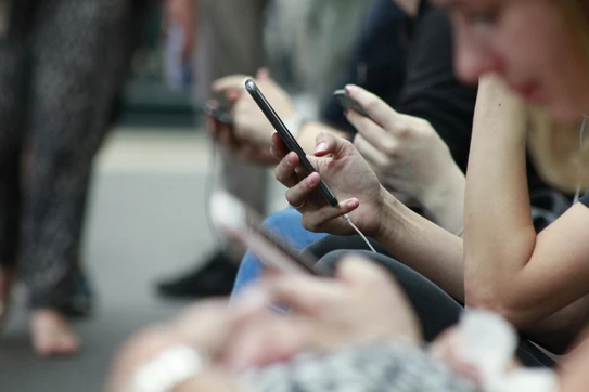 People scrolling on phones